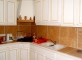 <p>Création d'une cuisine sur-mesure. finition bois lazuré blanc</p>